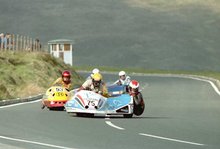 Thumbnail of 1984 TT - Bungalow - Dick Fletcher and Chris Sahw head off Les Hurst and Eric Amman