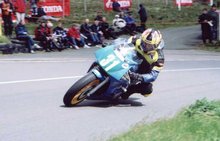 Thumbnail of Rounding the Bungalow TT2002