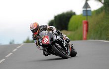 Thumbnail of Cameron Donald on his way to victory in the 2008 Scottish Life International Superstock TT