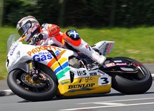 Thumbnail of John McGuinness on his way to victory in the 2008 Senior TT with the Padgetts Honda