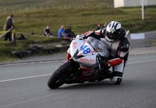 Thumbnail of Michael Dunlop rides his Supersport machine in the Thursday evening practice session at the 2008 TT