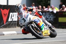 Thumbnail of John McGuinness on his way to victory in the 2008 Senior Race and his 14th TT win