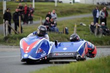Thumbnail of Sidecar team Dave Molyneux and Dan Sayle during Thursday evening practice at the 2008 TT