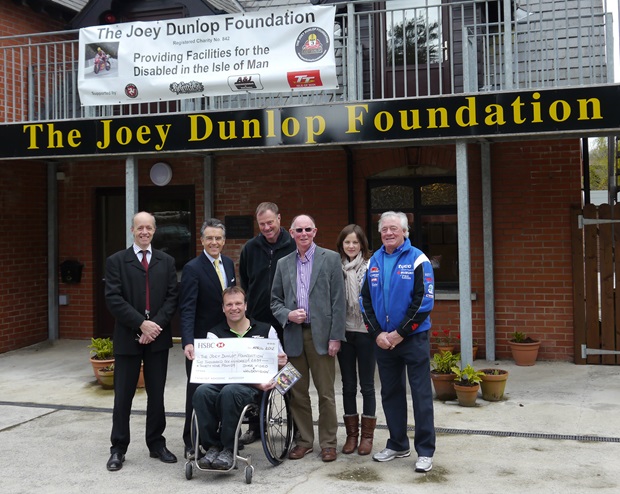  (From left) Joey Dunlop Foundation Chairman and Trustee John Watterson, Duke Managing Director Peter Duke, Foundation Trustees Bruce Baker and Kevin Quirk, Colin James and Anna Masefield of Waldovision and TAS Racing boss Hector Neill