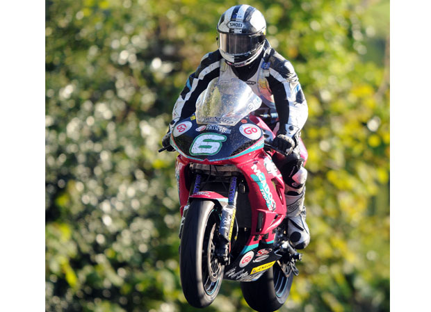 Michael Dunlop leaps Ballaugh Bridge during practice for the 2013 Lightweight TT