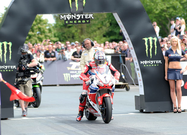 John McGuinness on the Honda Racing Fireblade superbike leaves the line to start the Pokerstars Senior race at the 2014 Isle of Man TT