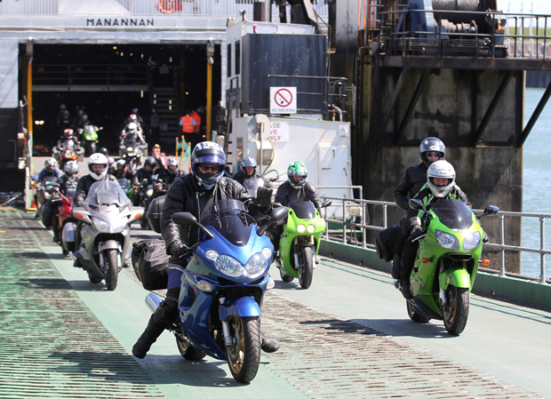 Bikes and passengers leave the Steam Packet Company's fast craft Manannan during the 2016 Festival of Motorcycling  Photo credit: Dave Kneen / Manxphotosonline