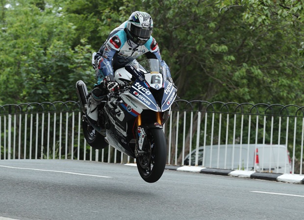 Michael Dunlop at Ballaugh Bridge on the way to winning the RST Superbike TT Race. Photo Dave Kneen / Pacemaker Press Intl