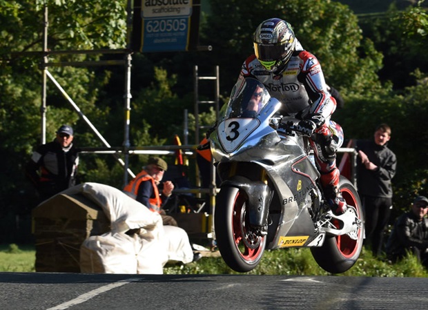 John McGuinness takes Ballaugh Bridge on the Norton Superbike during Tuesday's practice session. Photo RP Watkinson