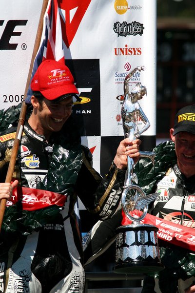 Cameron Donald receives his trophy after winning the 2008 Dainese Superbike TT