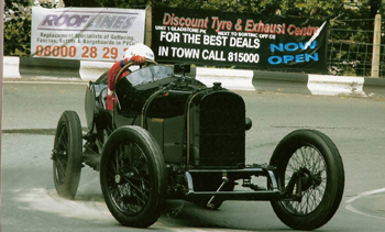 A vintage Sunbeam, seen here at Ramsey Hairpin in 2005, recreates the TT races