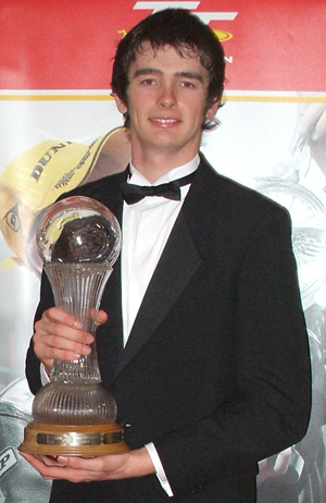 Conor Cummins receives his Duke Road Race Rankings trophy