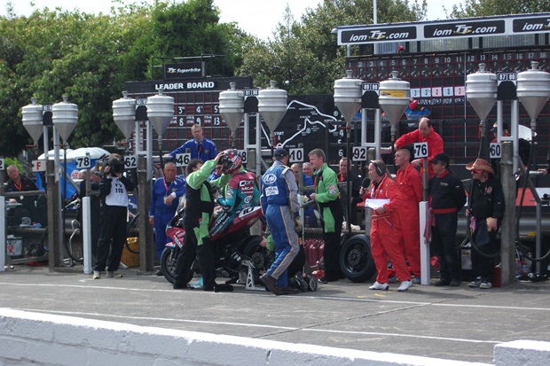 Conor Cummins in the pits at the end of lap two of the PokerStars Superbike TT