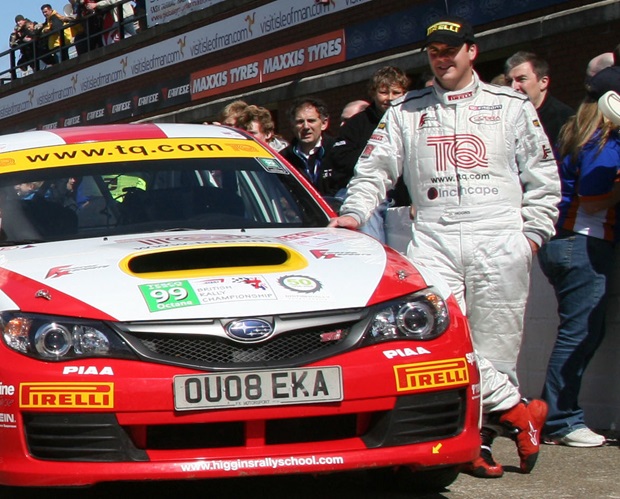 David Higgins pictured at the TT Grandstand with the Subaru Impreza (http://jakobebrey.com/)