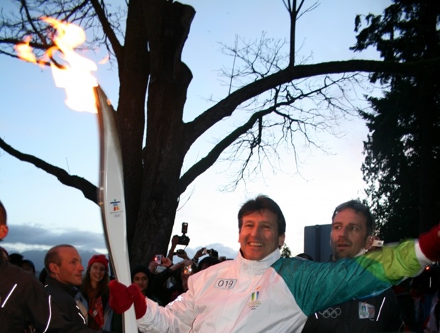 Sebastian Coe with the Olympic Torch (courtesy www.London2012.com)