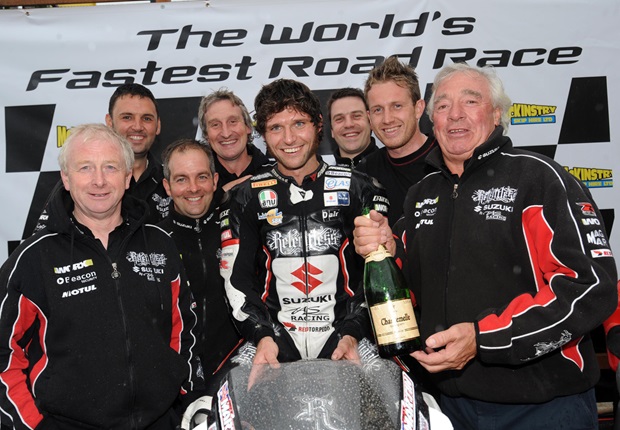 Guy Martin and the Relentless Suzuki by TAS Racing team celebrate