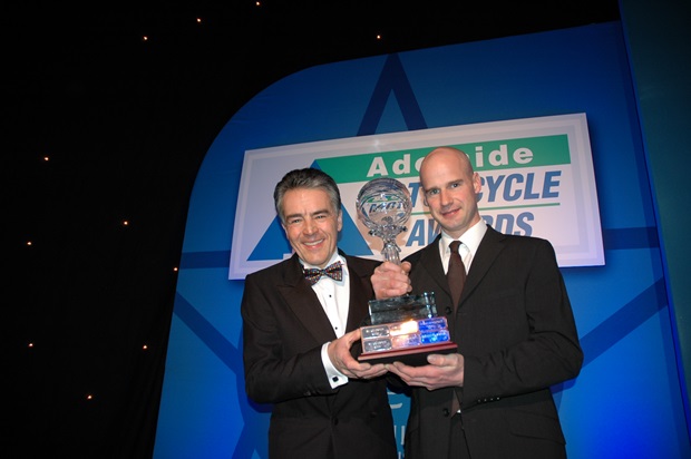 Duke managing director Peter Duke presents the Geoff Duke Trophy to 2011 Duke Road Race Rankings winner Ryan Farquhar