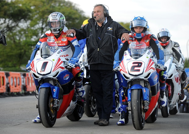 Keith Amor (right) prepares for action at the 2011 TT alongside Honda TT Legends teammate John McGuinness