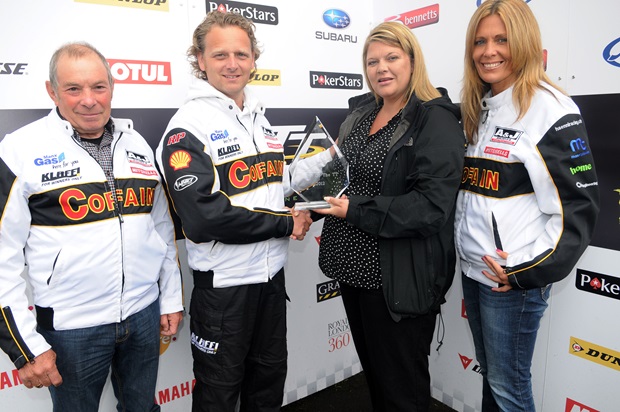 from (from left) Ben and Tom Birchall's father John, Cofain Racing team boss Klaus Klaffenbock, Becs Cubbon of PokerStars and Sarah Versluijs from Cofain Racing