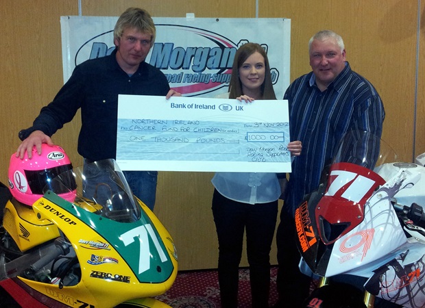 (from left) Isle of Man TT racer Davy Morgan, Natasha from NICFC and Davy Morgan Supporters Club Chairman Robert McKeag