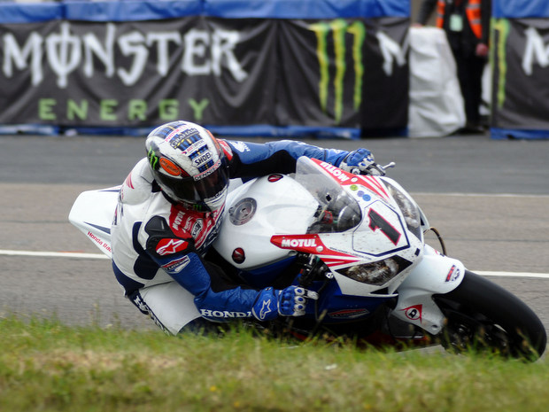 John McGuinness on the Honda TT Legends Fireblade at the 2012 Isle of Man TT fuelled by Monster Energy