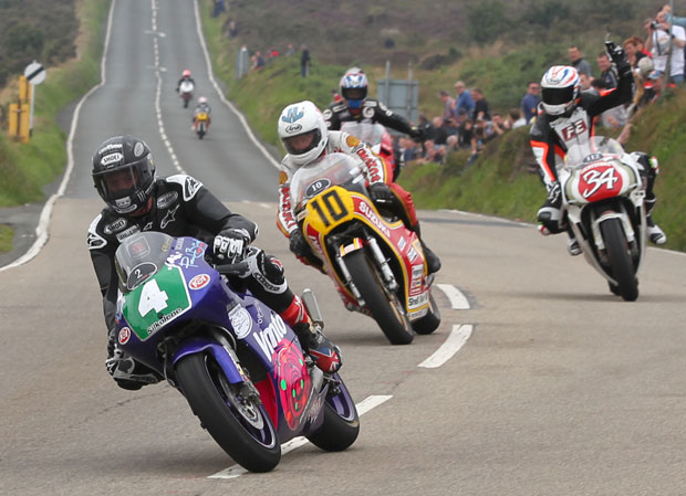 Picture by Dave Kneen at manxphotosonline shows John McGuinness (4), Mick Grant (10), Steve Plater (34) and Philip McCallen at the Creg Ny Baa during the 2013 Classic Racer Lap of Honour.