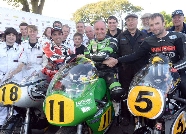 Ian Lougher (winner) with Bruce Anstey and Dan Cooper in the winners enclosure of the 2014 500cc Classic TT