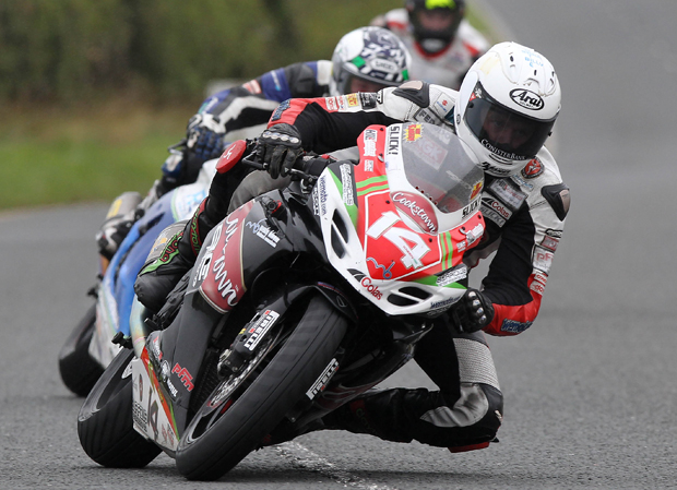 Dan Kneen leads Dean Harrison and Bruce Anstey at Dundrod