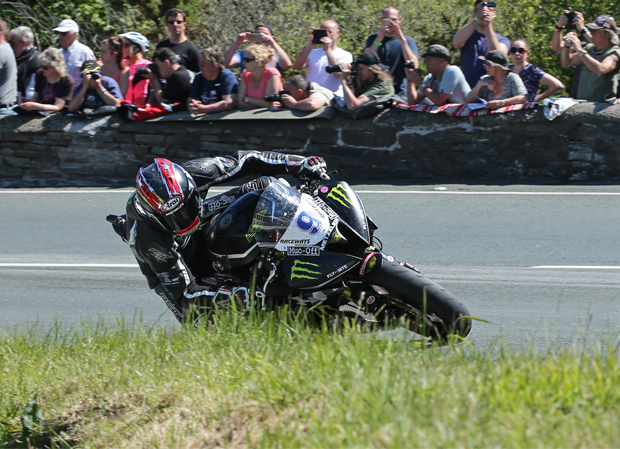 Ian Hutchinson on his way to winning the Monster Energy Supersport race at TT 2015 for Team Traction Control. Photo by Dave Kneen
