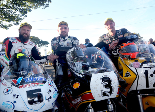 Bruce Anstey, Michael Dunlop and Ryan Farquhar in the winners' enclosure following the 2015 Motorsport Merchandise Formula One Classic TT Race