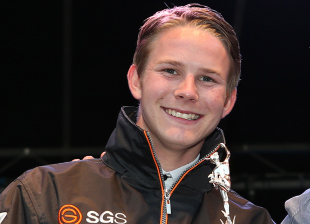 Danny Webb, holding a silver finisher's replica