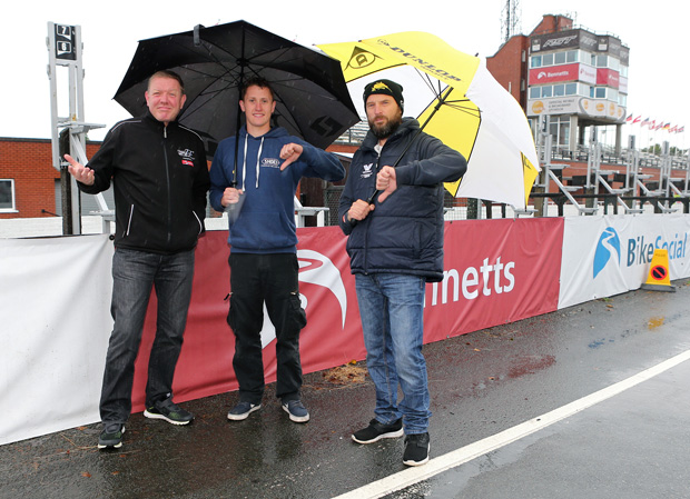 Clerk of the Course Gary Thompson with Classic TT riders Dean Harrison and Bruce Anstey assessing the weather conditions on Saturday 20th August - the forecast for Monday 22nd August is much improved. Photo credit: Dave Kneen / Manxphotosonline.com