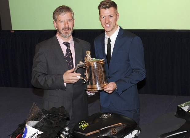 Ian Hutchinson being presented with the Torrens Trophy