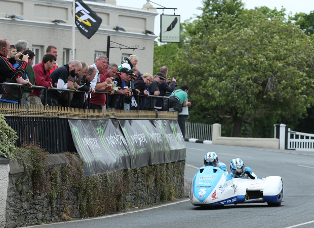 John Holden and Andy Winkle sweep past the crowd at the Raven Hotel in Ballaugh