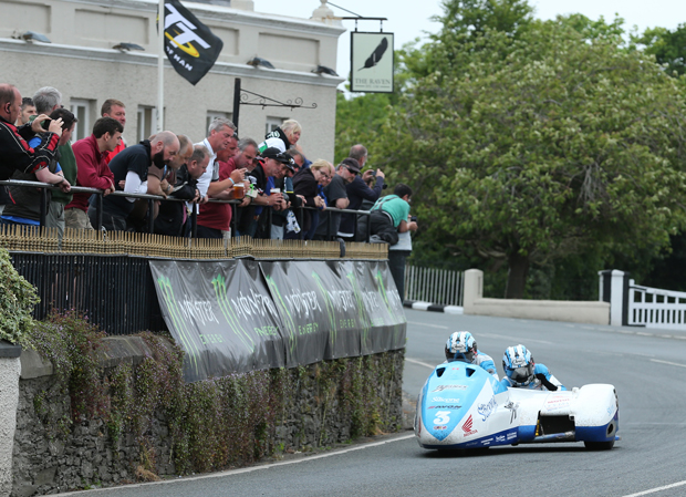 John Holden and Andy Winkle sweep past the crowd at the Raven Hotel in Ballaugh
