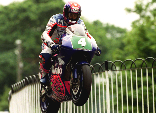 John McGuinness leaps Ballaugh Bridge on his way to winning the 1999 Lightweight TT 