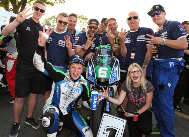 Ivan Lintin and the Devitt RC Express team celebrate their success in the Bennetts Lightweight TT. Credit Stephen Davison / Pacemaker Press Intl.