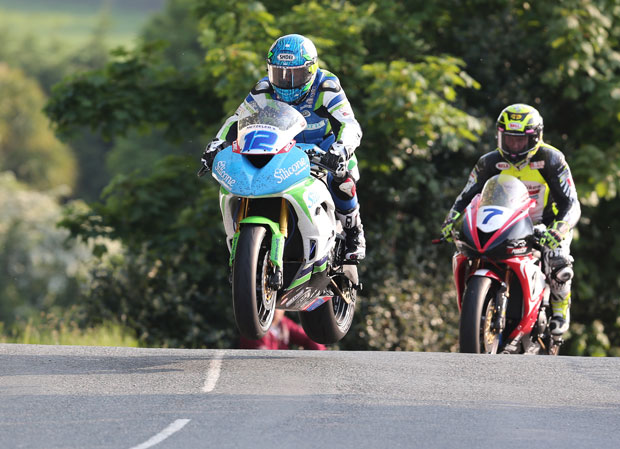 Dean Harrison leads Gary Johnson over Ballaugh Bridge in the first qualifying session of TT 2016