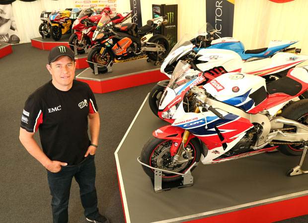 John McGuinness with some of the highlights of the 20th anniversary collection