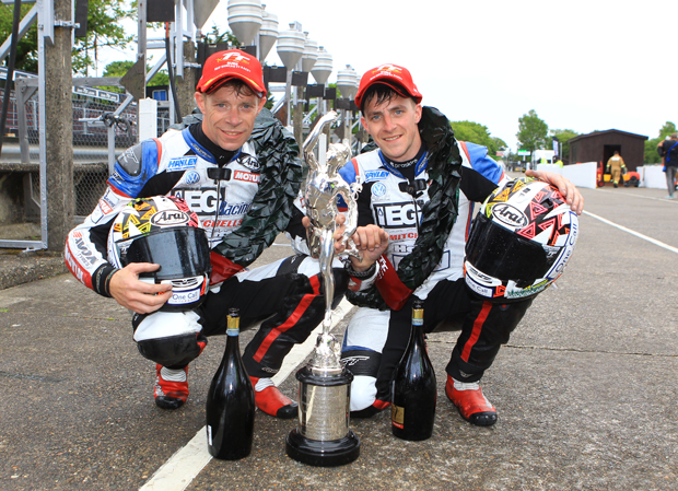 Birchall brothers with the trophy