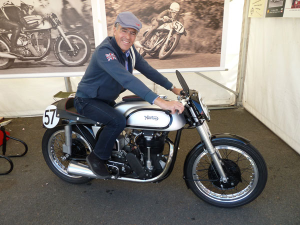 Peter Duke, Geoff Duke's son, with a 1950 Works Norton campaigned by his father and restored by New Zealand's Ken McIntosh