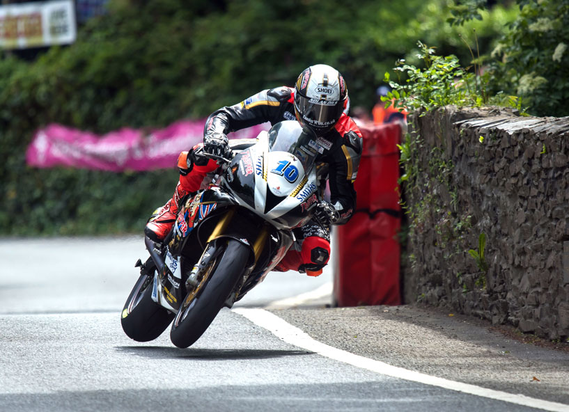 Peter Hickman in action on the Smiths Racing Trooper Beer Triumph at TT 2017