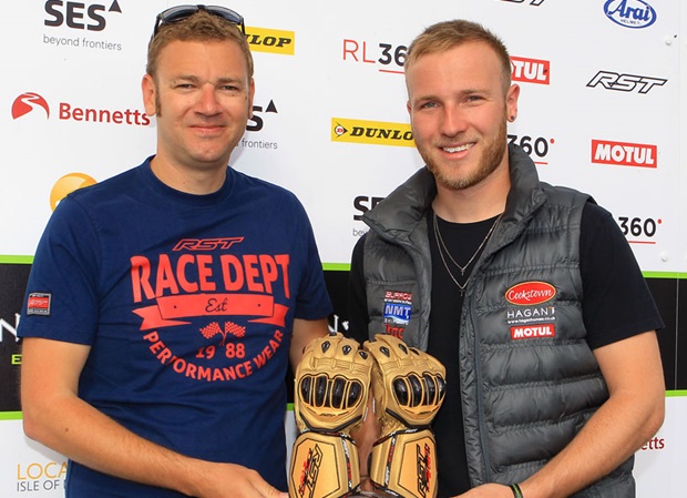RST's Jonny Towers presents the 'Star of Tomorrow' award to TT newcomer Davey Todd.